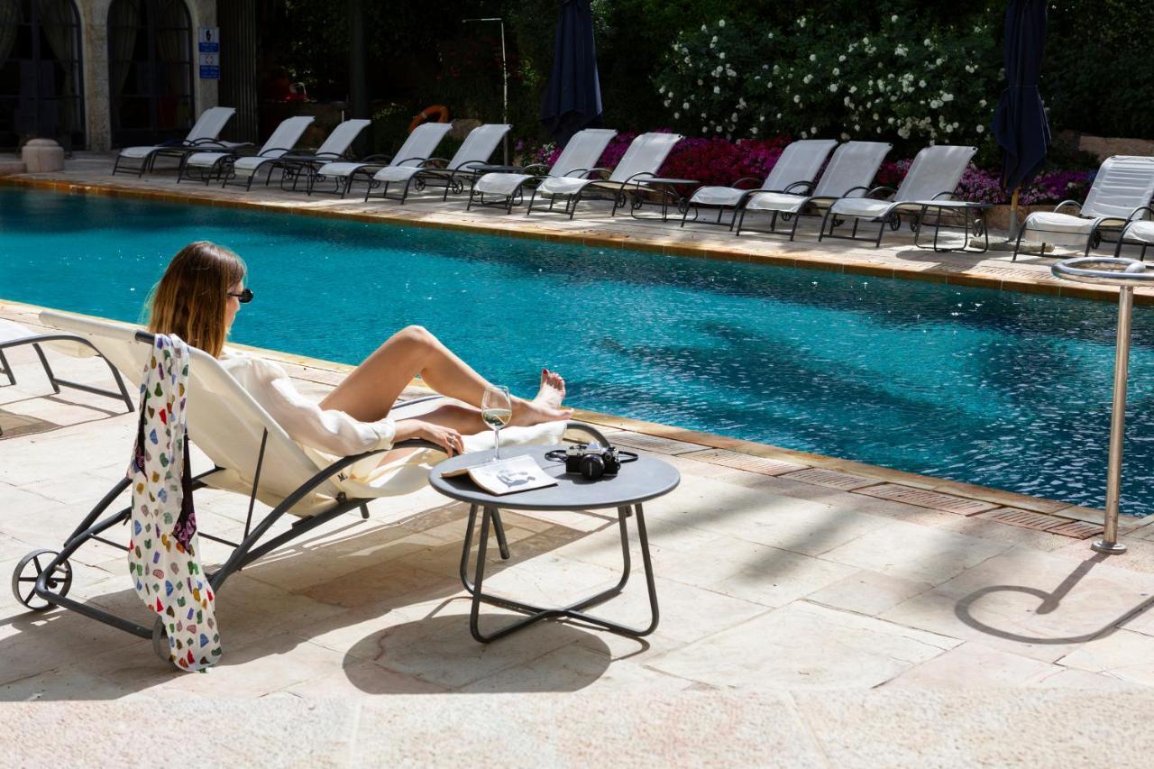 The American Colony Hotel - Small Luxury Hotels Of The World Jerusalem Exterior photo The pool at the Hotel de Crillon